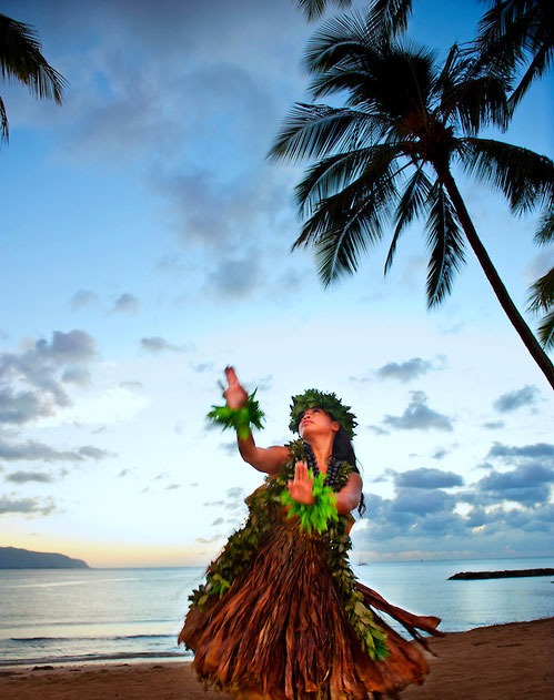 Kahiko hula dancer on the beach at Haleiwa on Oahuʻs north shore.